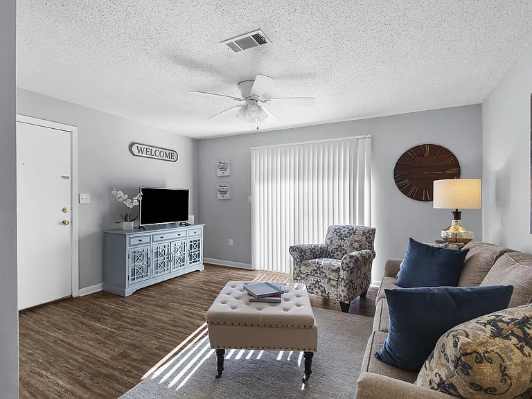 Cozy, open living spaces perfect for relaxing or entertaining at Lakeland East Apartments in Flowood, MS. Managed by Highlands Vista Group.