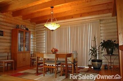 dining room
						:
						outside is a large wrap around mahogany deck which overlooks conservation land.