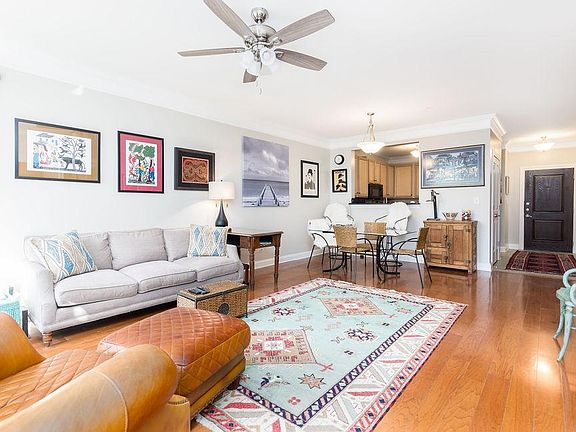 Living Space looking to front door and kitchen.