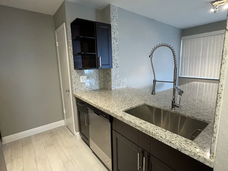 2810 N Oakland Forest Dr #104 — Photo 7