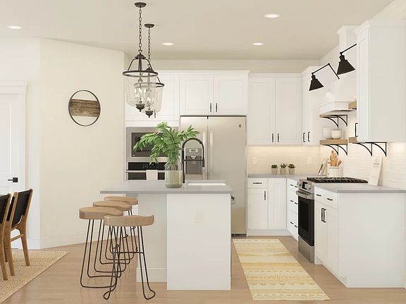 Kitchen with island, pendant lighting and open shelving