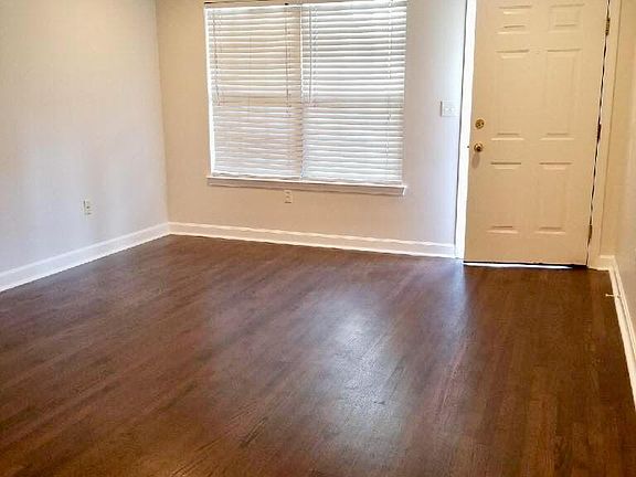 New Espresso floors and crown molding in living room
