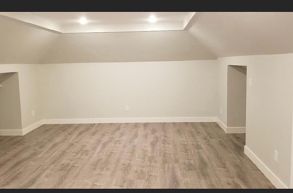 facing rear wall w/ closets and storage on either side