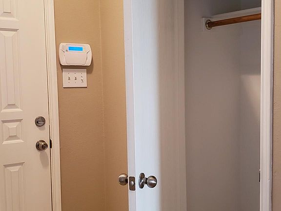 COAT CLOSET BY ENTRY DOOR