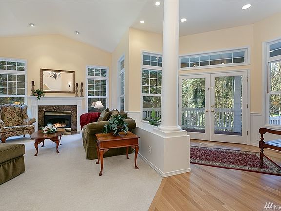 Transom windows above all windows and each door make the formal areas exceptionally open and light!