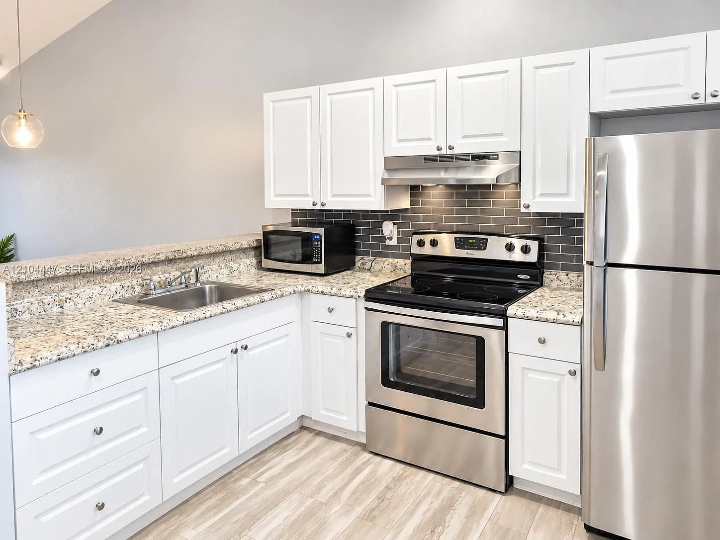 Gardens Of Sunrise Condo — Photo 2