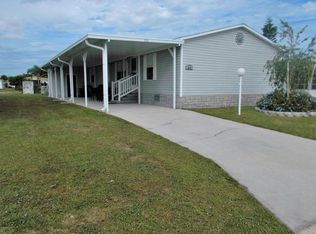 910 Pecan Cir, Barefoot Bay, FL 32976