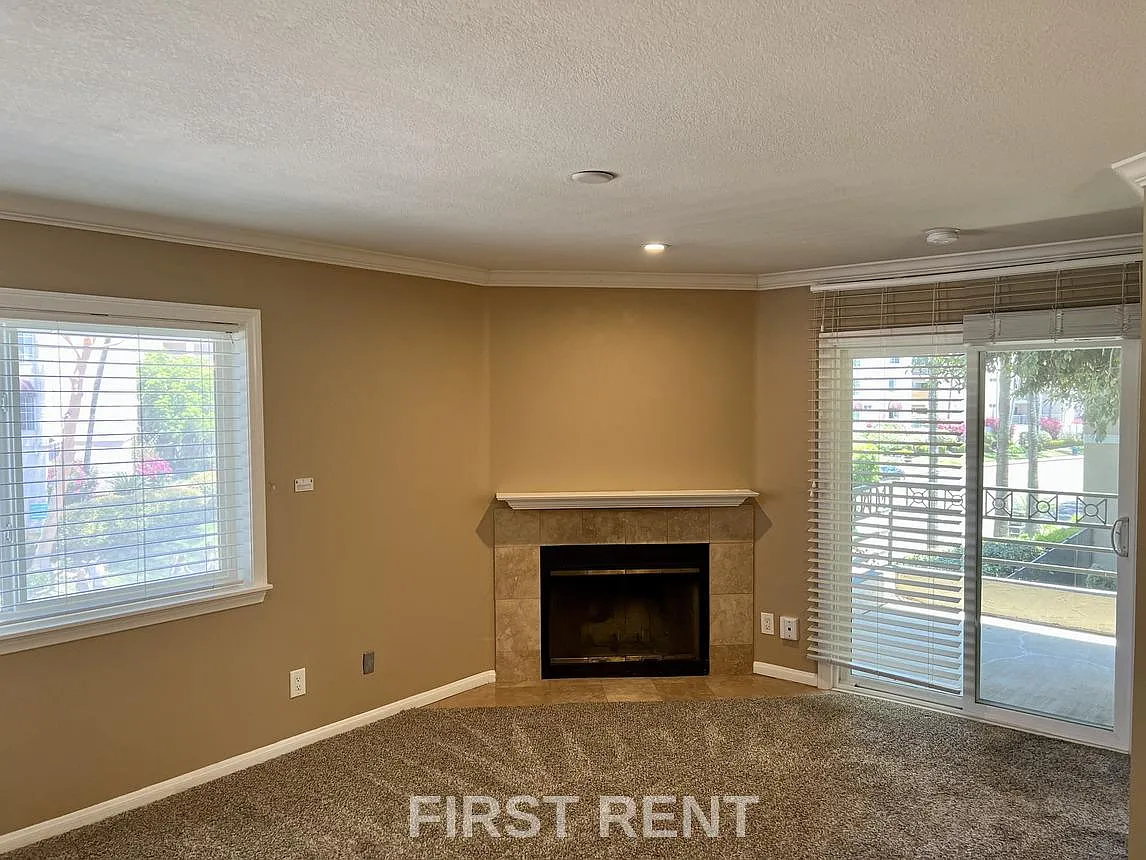 Building Photo - 7585 Charmant Dr #802
