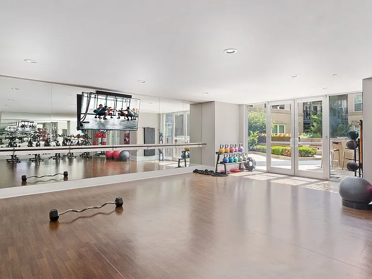 Stretch out in the separate yoga studio with ballet barre