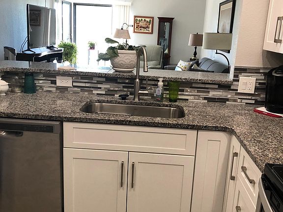 Kitchen with new appliances and granite countertops