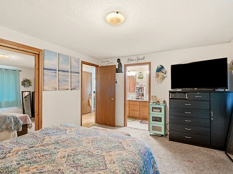 Main bedroom has pocket door to main bathroom