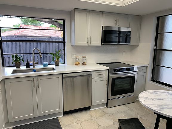 Kitchen with side-patio view