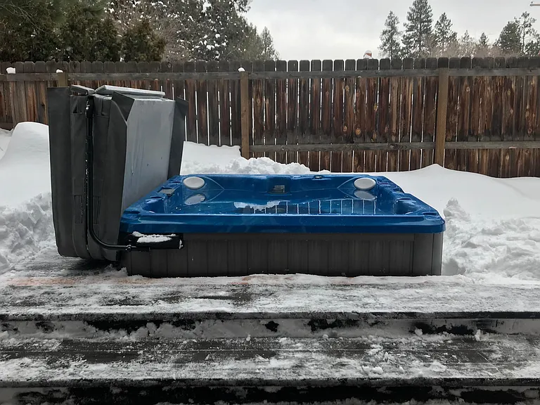 New hot tub off of family room.