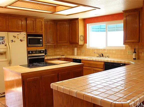 Kitchen with center island window views