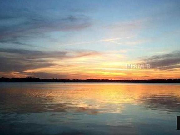 Lake with a glorious and romantic sunset. ( Seen from the po