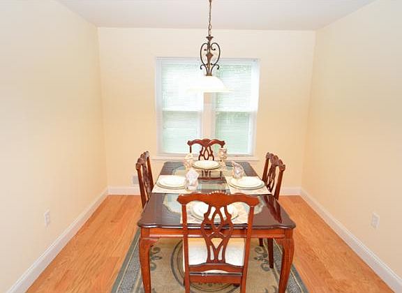 Formal dining room also has hardwood floors