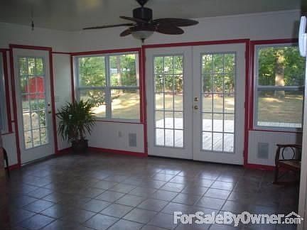 Gorgeous Sun Room : Enjoy the view all year round in this comfy sunroom.