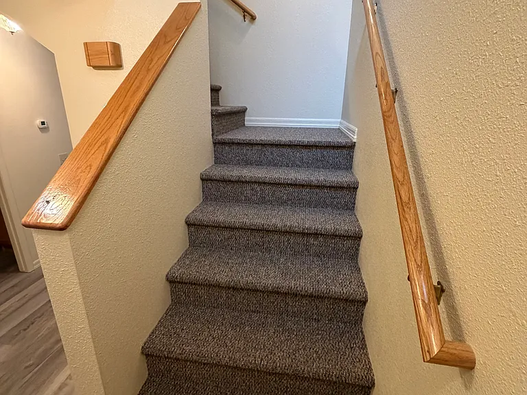 Stairs to bedrooms.