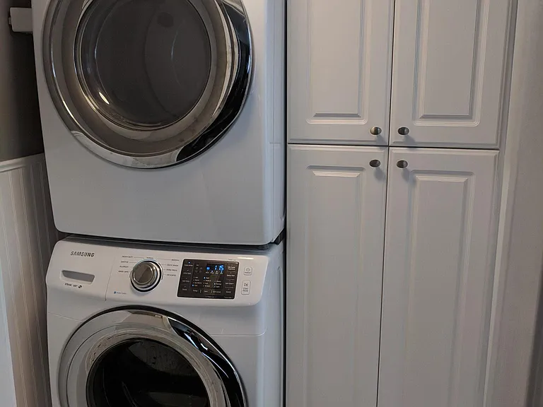 Laundry and storage in bathroom