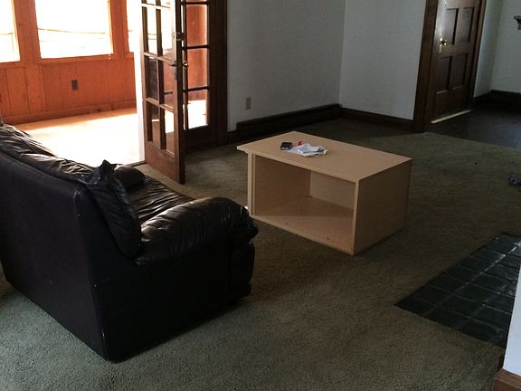 Living room and 3-season porch.