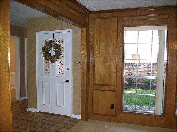 A TILE FOYER, & RECENTLY PAINTED INTERIOR