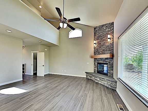 Living room with natural light and walk-in storage room