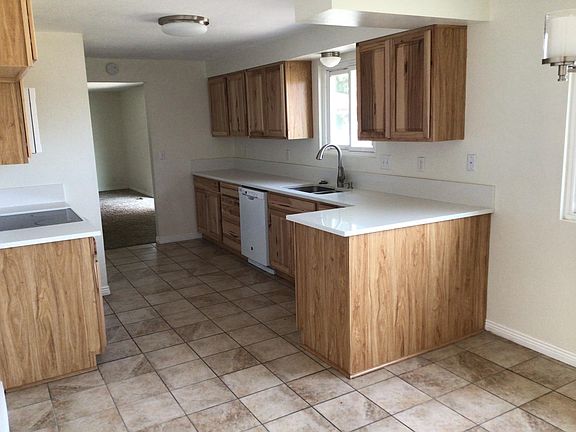 Kitchen with quartz counter tops.