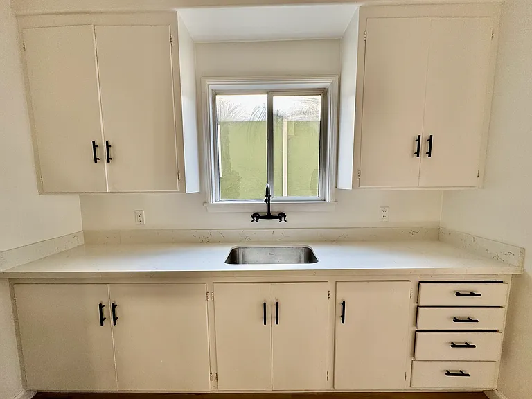 Kitchen sink and cabinets
