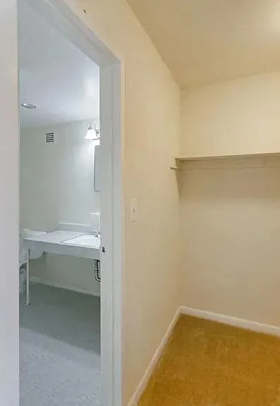 Studio Large Walk-In Closet and Bathroom with 4' Vanity