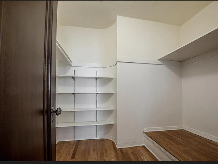 Large walk in closet off living room and office