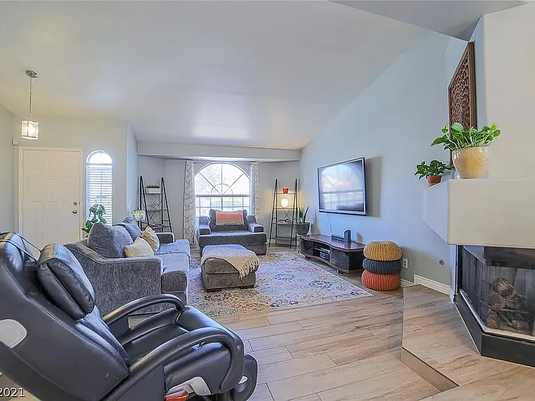 Sunken living room, fireplace.