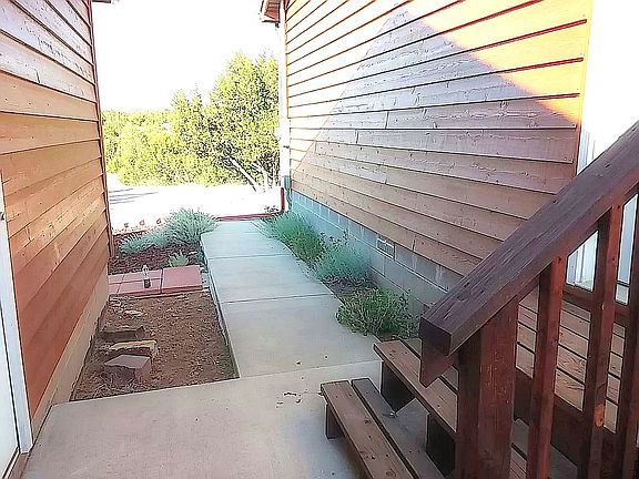 Sidewalk Between House & Gar