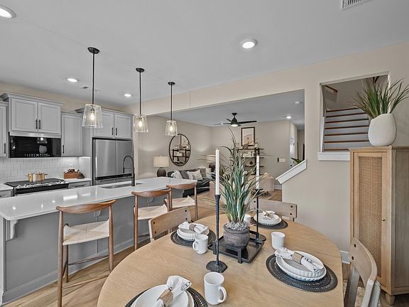 Luxe 2 story townhomes with garage, elevated ceilings, walk-in closets, 9-foot kitchen island nea