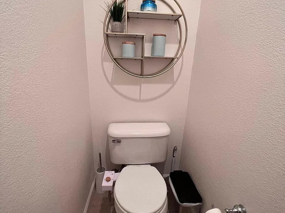 Toilet at master bathroom