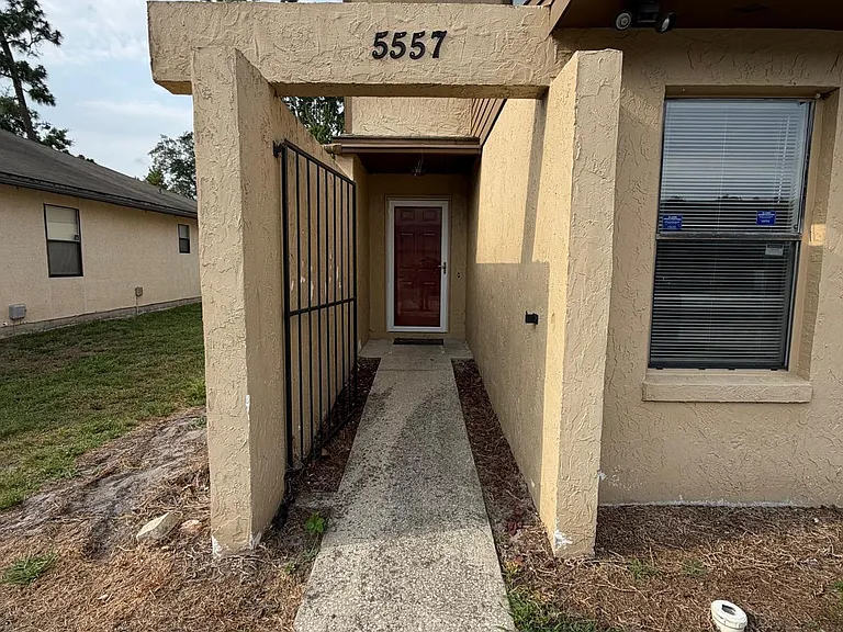 5557 Greatpine Ln S — Photo 1