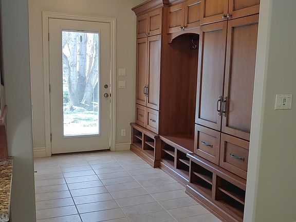 Entry lockers, bench seat and shoe cubbies.