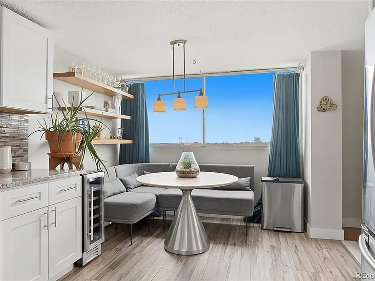 Eat-in kitchen with stainless steel appliances