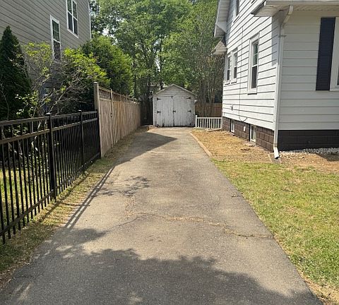 Driveway can park up to 3 vehicles.