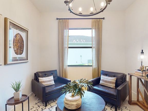 Near the foyer is a versatile den that can be easily transformed to suit the household s needs - whe