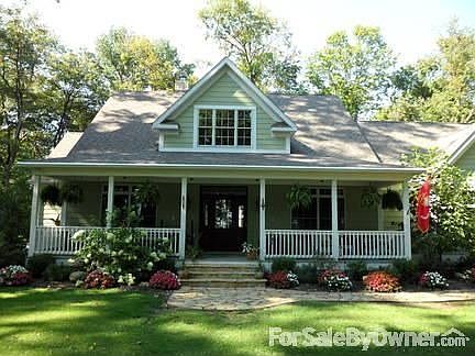 Enjoy the peace of the front porch swing
						:
						Enjoy a cup of coffee while watching the multiple birds and flowers.
