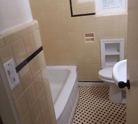 Bath with shower/tub combo