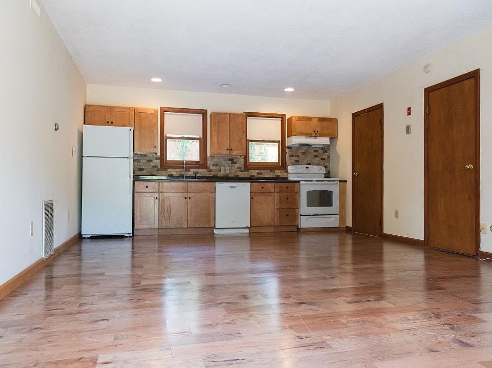 kitchen and living area, .5 bath and washer/dryer.