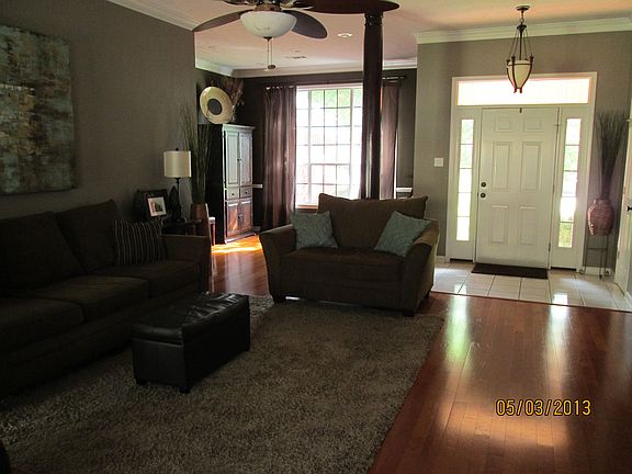 Living room w/ formal dining