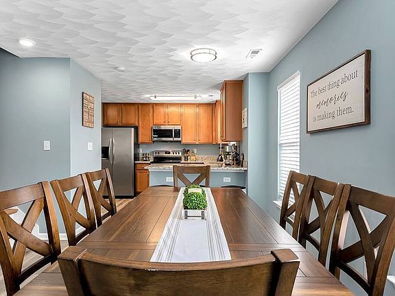 Large dining table with lots of seating