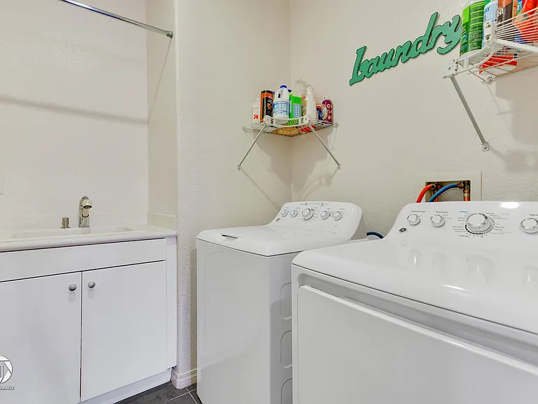 Laundry room with sink