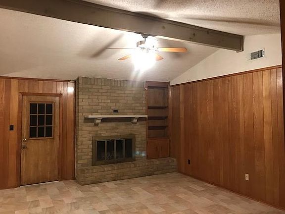 Living room with fireplace. 