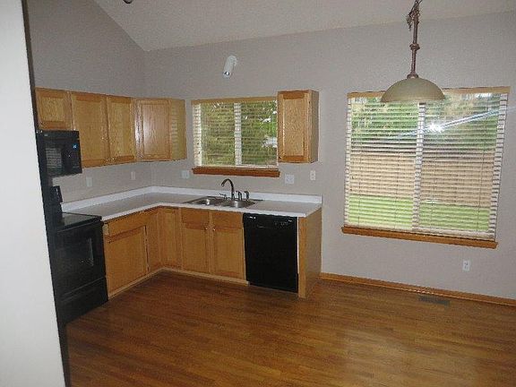 Kitchen with eat in dining area.