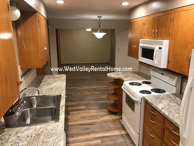 New improved kitchen with brand new gorgeous flooring!