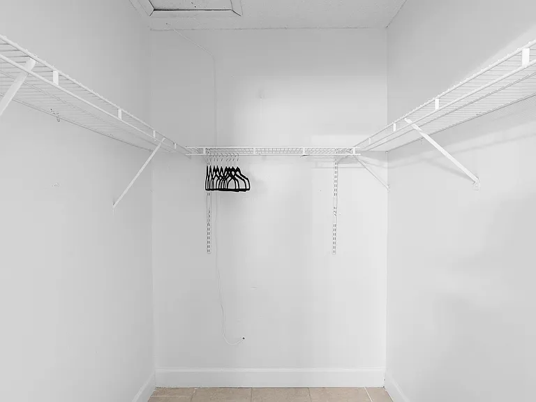 Spacious walk-in closet with built-in racks & storage Sanford, FL