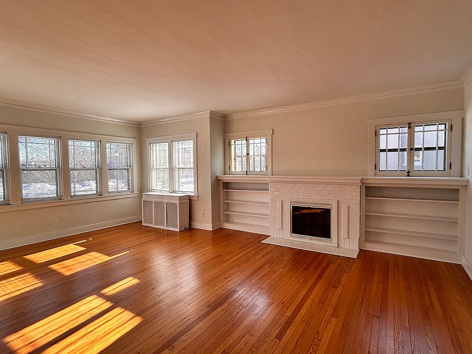Living room with red oak floors